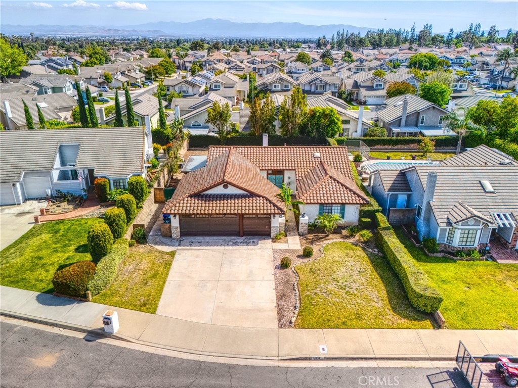 9841 Golden Arrow Lane Rancho Cucamonga, CA 91701 - Photo 45 of 53 an aerial view of a house with swimming pool