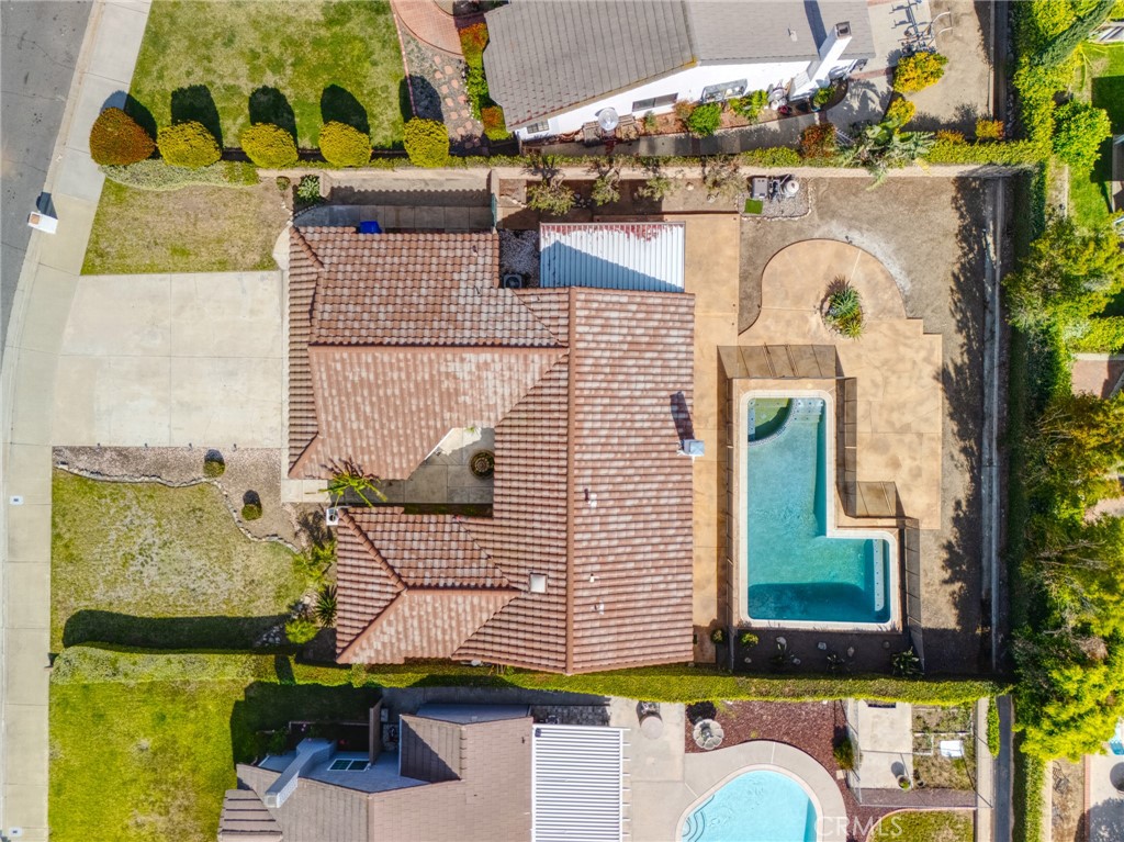 9841 Golden Arrow Lane Rancho Cucamonga, CA 91701 - Photo 49 of 53 a front view of a house with garden