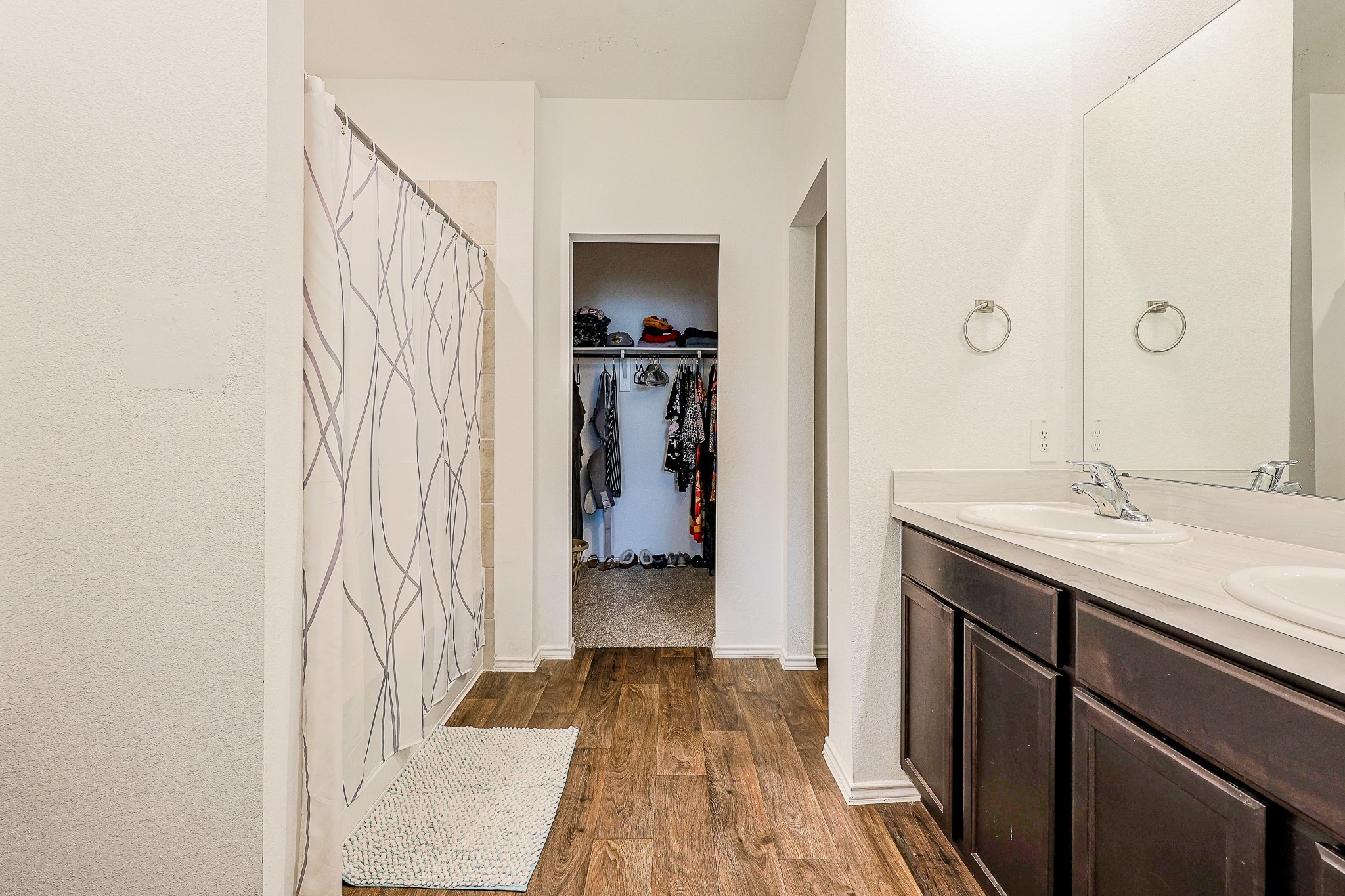 22603 Aspen Tarn Trail Spring, TX 77373 - Photo 12 of 20 a bathroom with a sink and a mirror