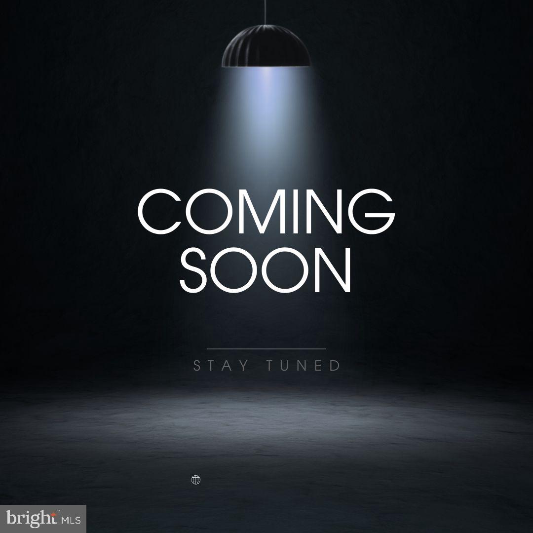 6628 Partlow Road Spotsylvania, VA 22551 - Photo 1 of 1 a bathroom with a mirror and a sink