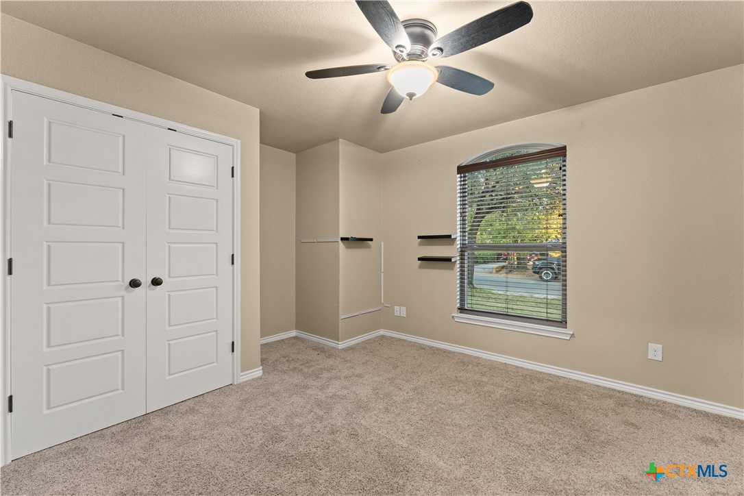 250 Old Waco Road Gatesville, TX 76528 - Photo 15 of 23 a view of an empty room with a window