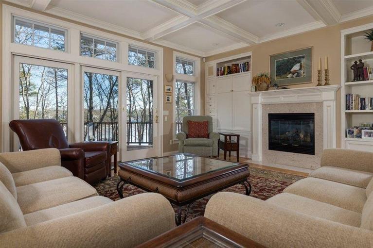 7 Harbor Ridge Road Mashpee, MA 02649 - Photo 14 of 26 a living room with furniture and a fireplace