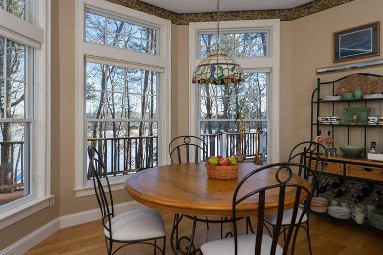 7 Harbor Ridge Road Mashpee, MA 02649 - Photo 17 of 26 a view of a a dining room with furniture window and wooden floor