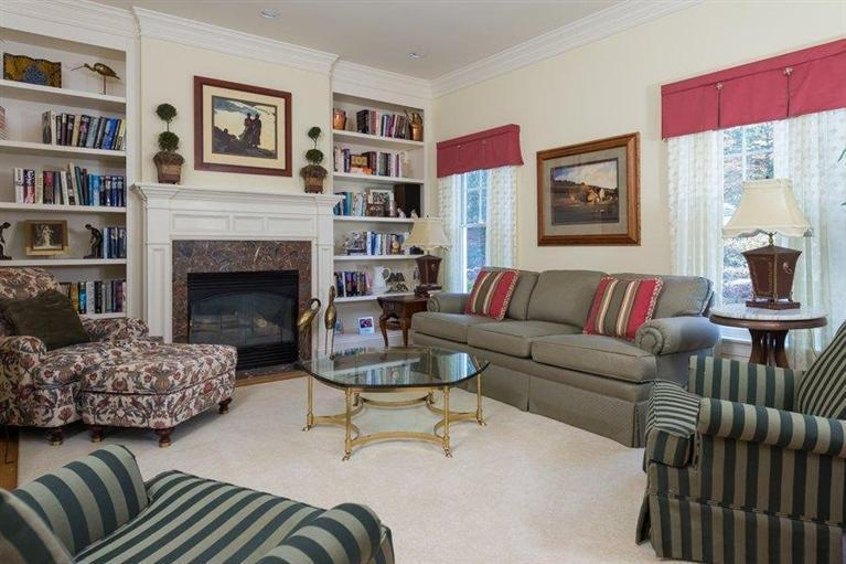 7 Harbor Ridge Road Mashpee, MA 02649 - Photo 20 of 26 a living room with furniture and a fireplace