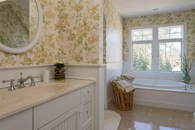 7 Harbor Ridge Road Mashpee, MA 02649 - Photo 24 of 26 a bathroom with a sink and a bathtub