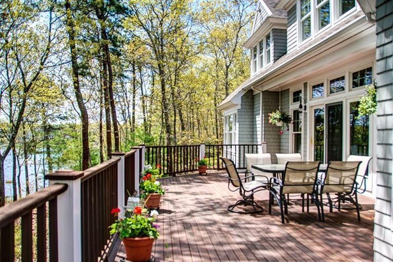 7 Harbor Ridge Road Mashpee, MA 02649 - Photo 4 of 26 a view of a two chairs and table in the balcony
