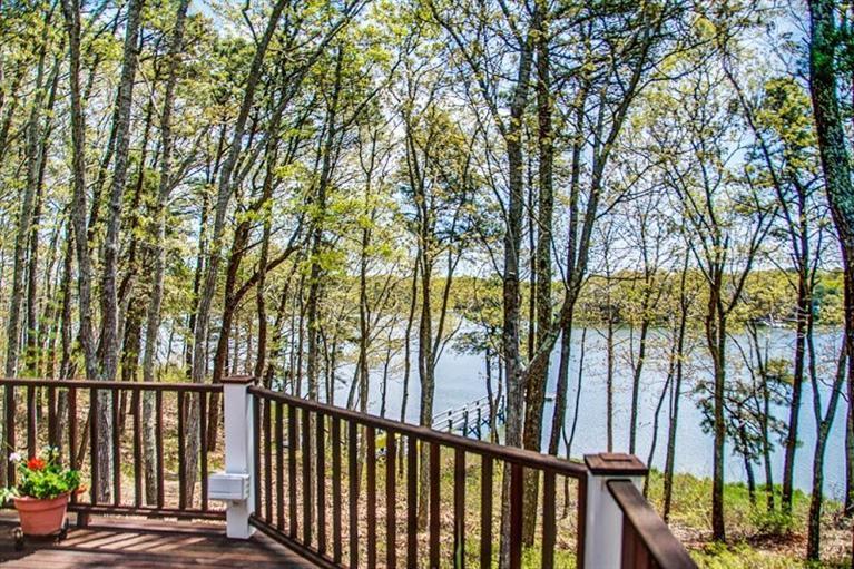 7 Harbor Ridge Road Mashpee, MA 02649 - Photo 5 of 26 a view of a backyard