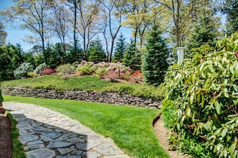 7 Harbor Ridge Road Mashpee, MA 02649 - Photo 8 of 26 a view of a garden with plants