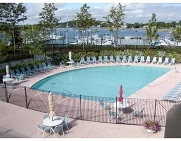 a view of a garden with a sign board