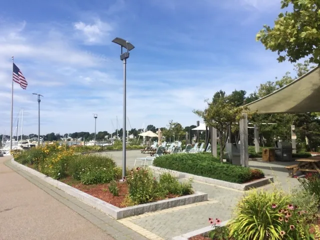 a view of a garden with sitting area