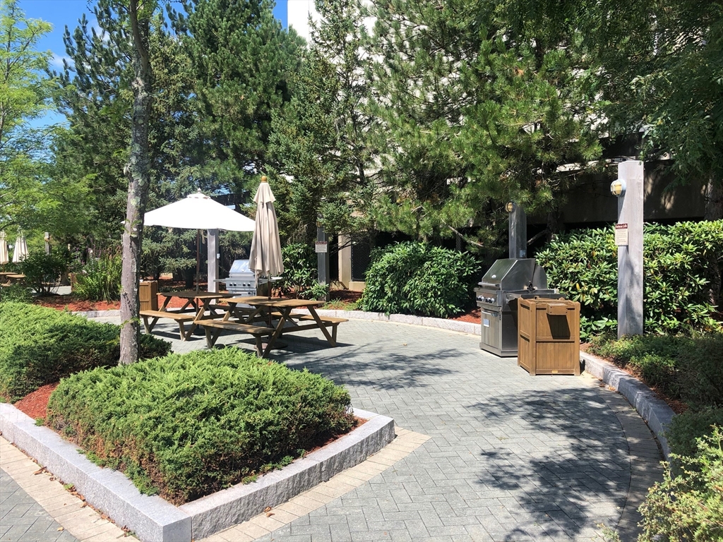 73 Broad Reach, Unit M55C Weymouth, MA 02191 - Photo 17 of 18 a view of a garden with sitting area