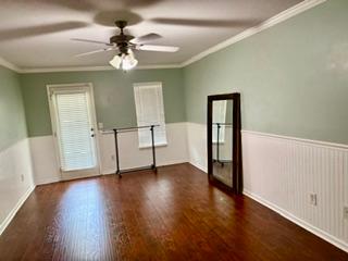 106 Antique Court Pendleton, SC 29670 - Photo 16 of 18 Rich hardwood flooring complements light green walls and bright trim in this generously sized room, 3rd bedroom, chair rail molding