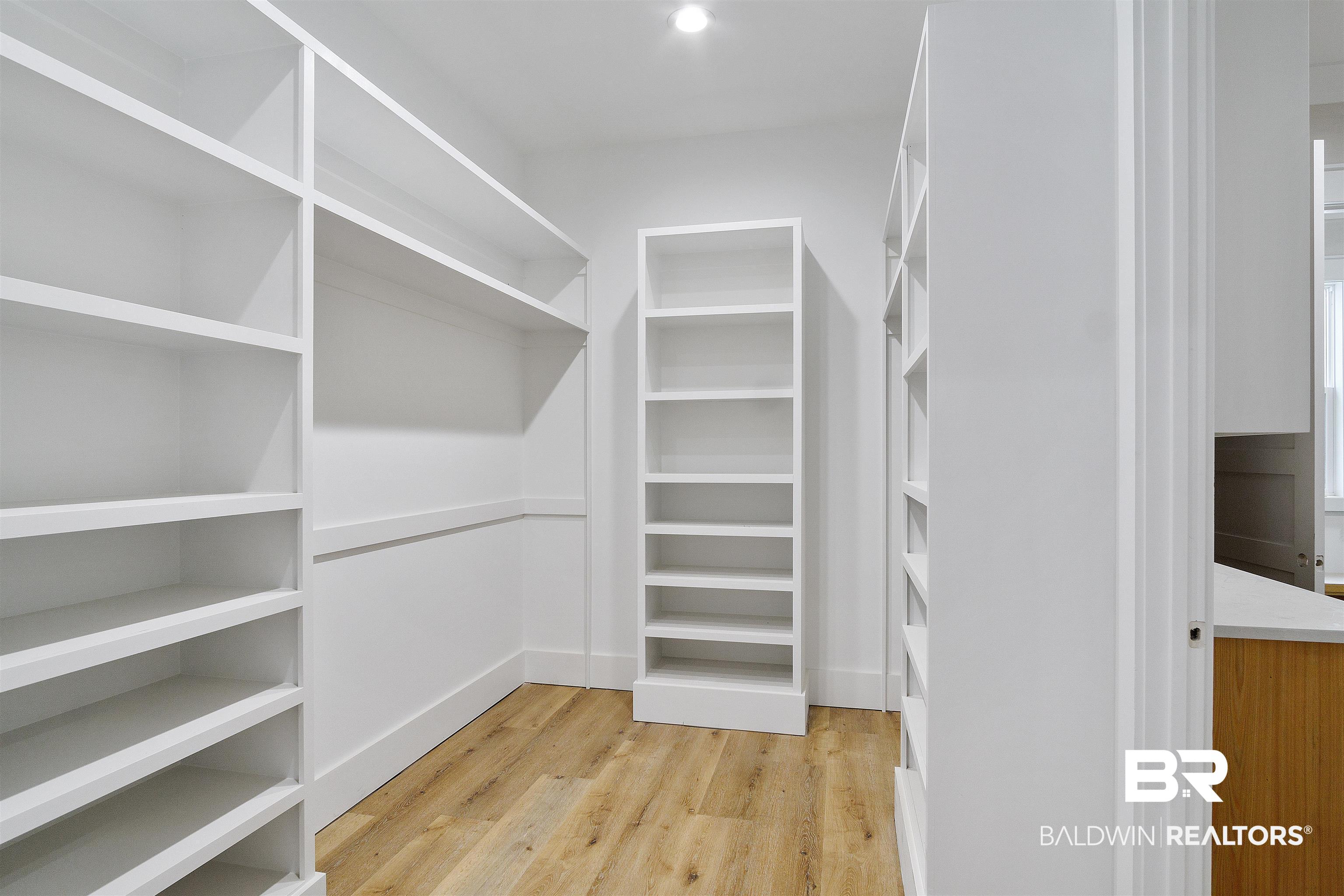5374 Millhouse Road Gulf Shores, AL 36542 - Photo 17 of 41 Master closet