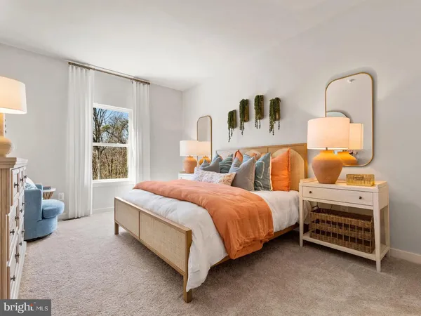 a bedroom with bed and window