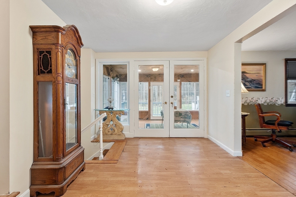 4.5 Old Battery Road Townsend, MA 01474 - Photo 11 of 42 a living room with furniture and large windows