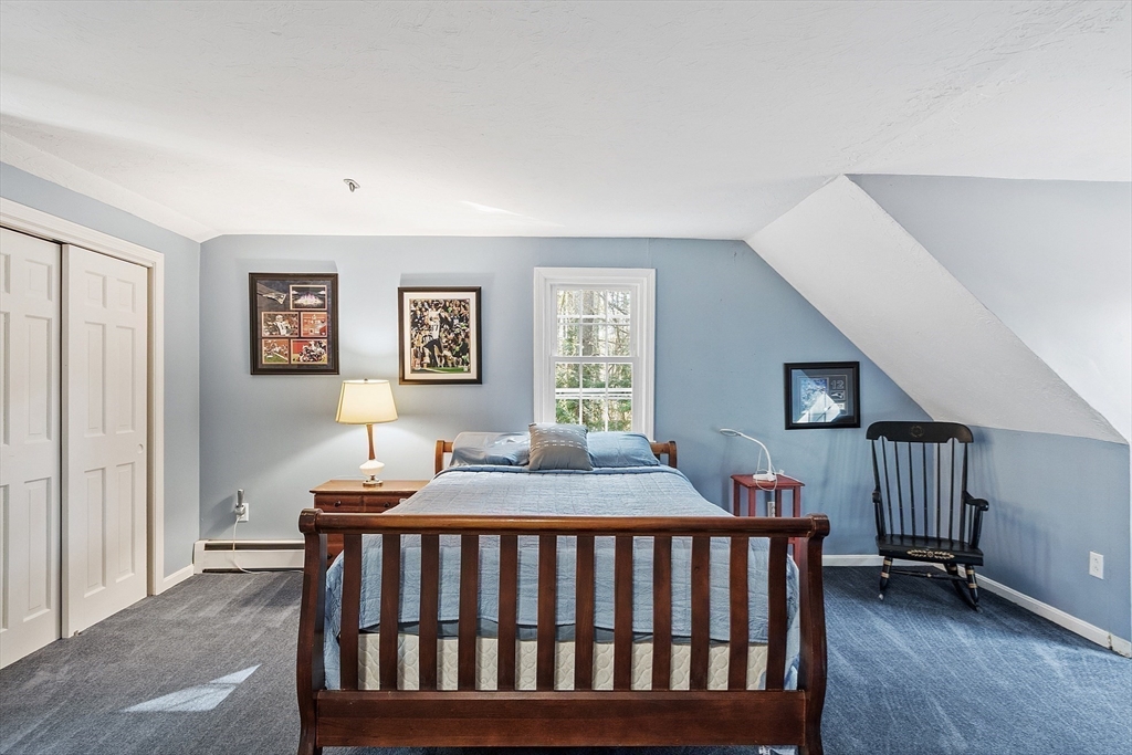 4.5 Old Battery Road Townsend, MA 01474 - Photo 17 of 42 a bedroom with furniture and a window