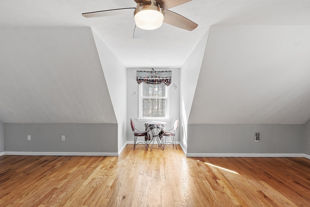 4.5 Old Battery Road Townsend, MA 01474 - Photo 21 of 42 a view of a room with wooden floor and furniture