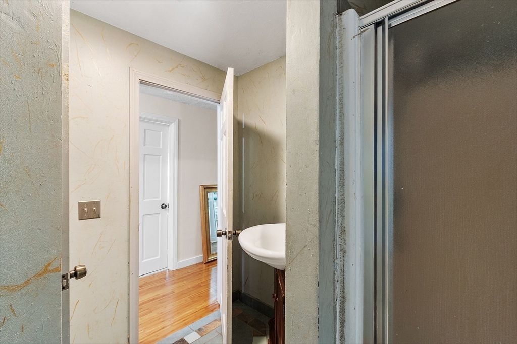 4.5 Old Battery Road Townsend, MA 01474 - Photo 23 of 42 a bathroom with a granite countertop sink