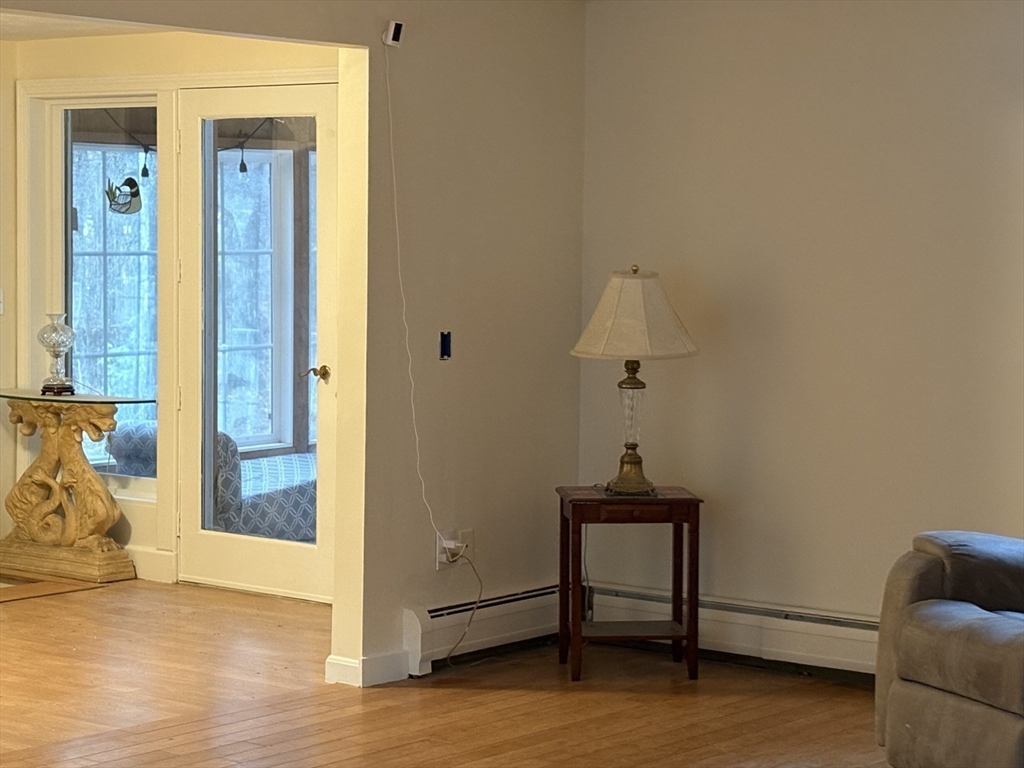 4.5 Old Battery Road Townsend, MA 01474 - Photo 10 of 42 a view of a livingroom with furniture and a window