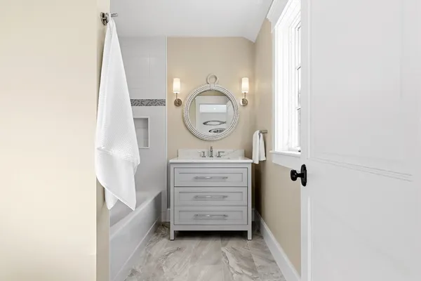 a view of a hallway with washer and dryer