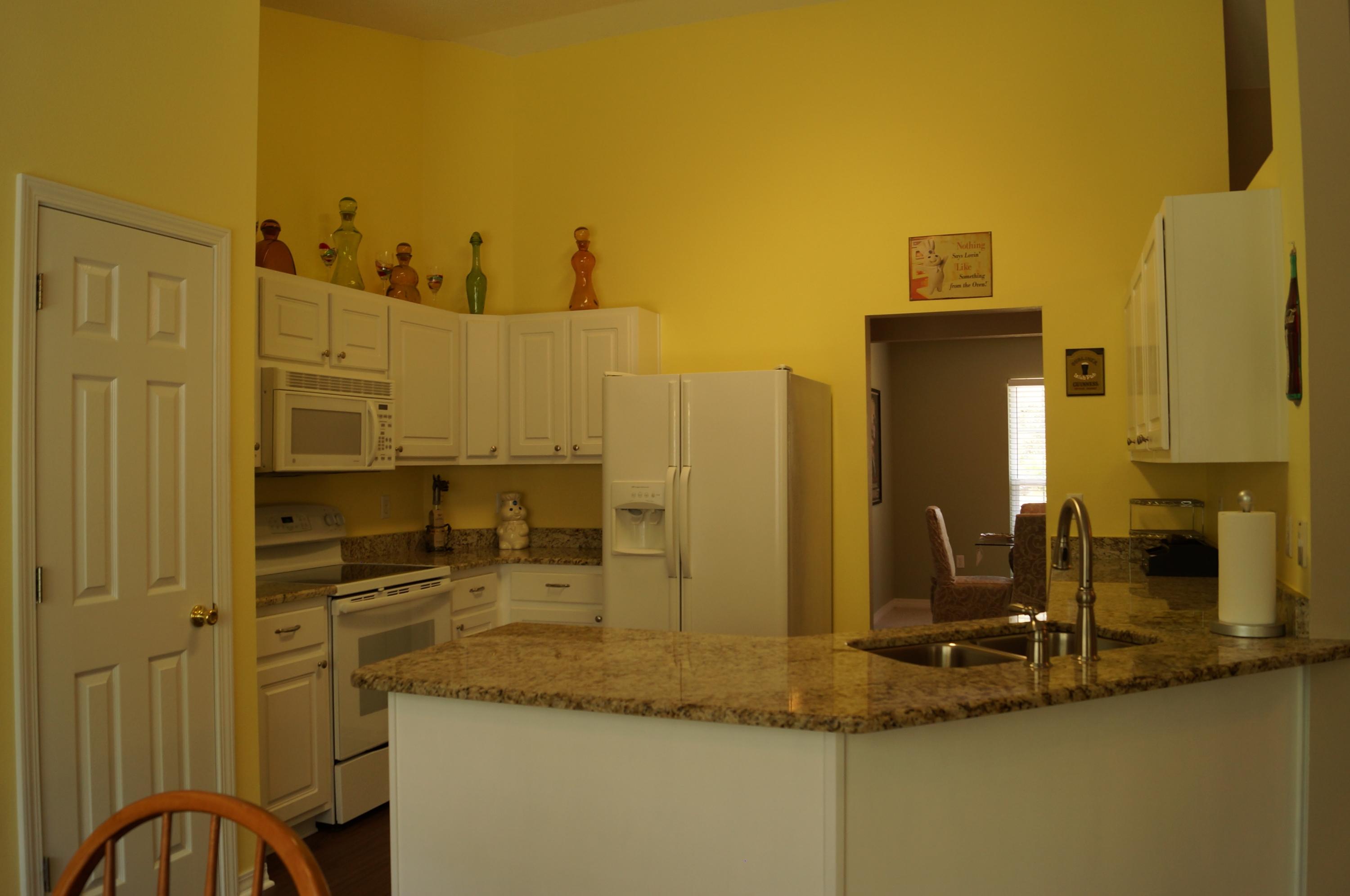 2429 Valley Road Navarre, FL 32566 - Photo 14 of 31 a bathroom with a granite countertop sink and a mirror