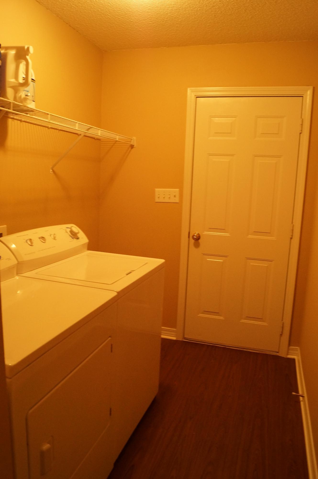 2429 Valley Road Navarre, FL 32566 - Photo 18 of 31 a view of a room with storage