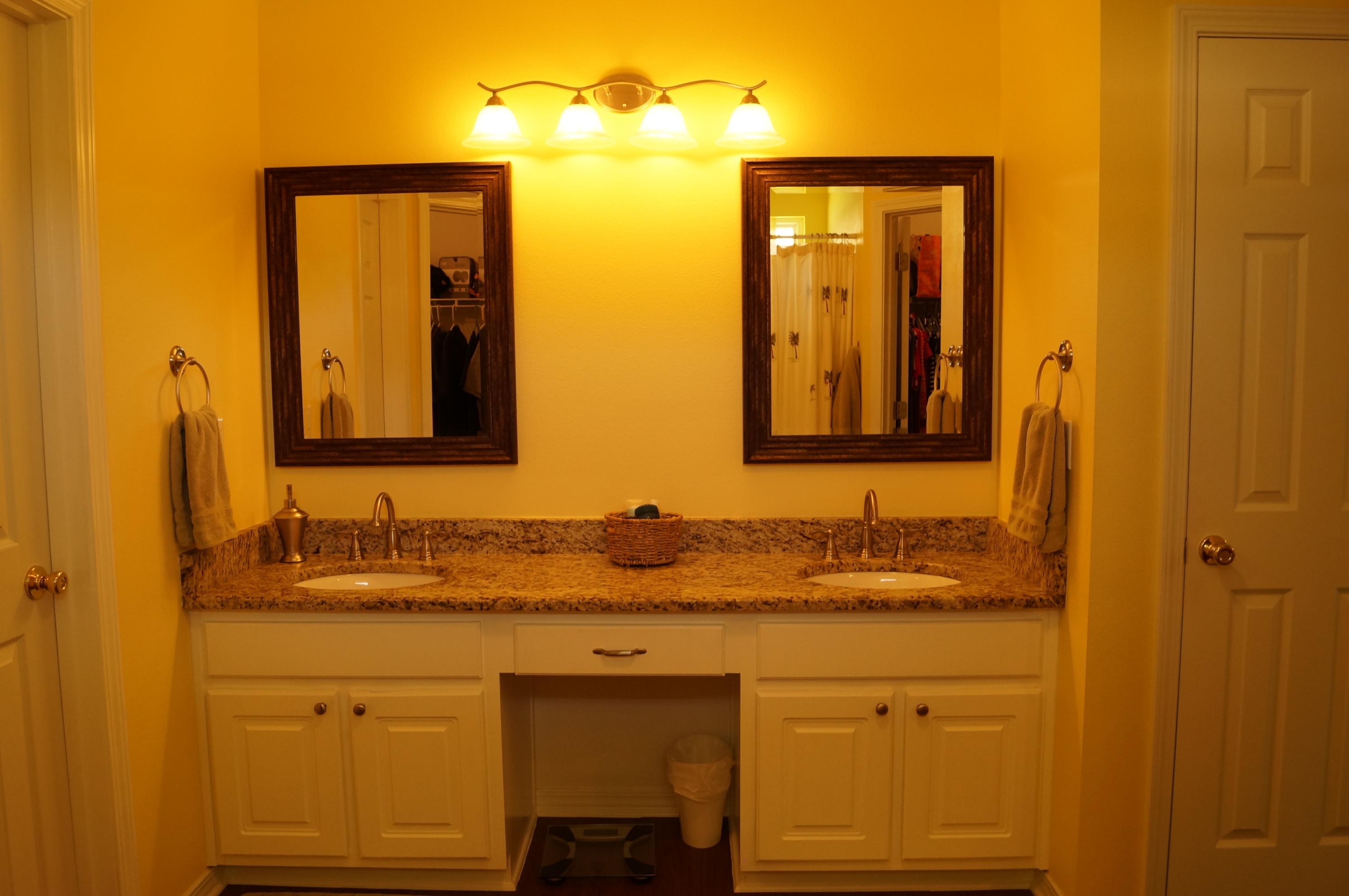 2429 Valley Road Navarre, FL 32566 - Photo 22 of 31 a bathroom with a sink and a mirror