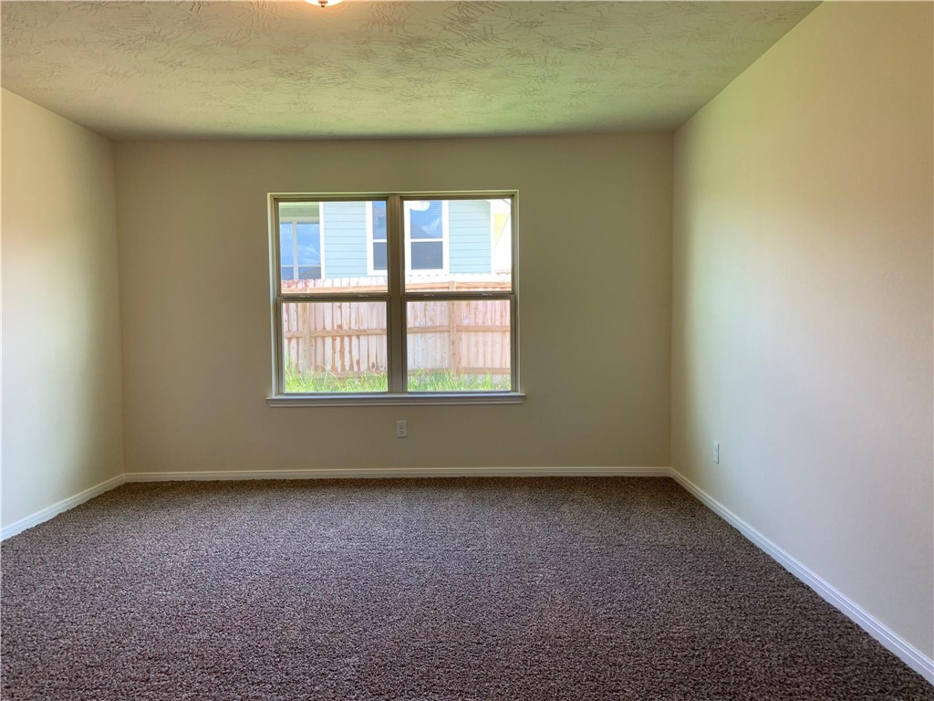139 Bates Court Huntsville, TX 77320 - Photo 13 of 21 an empty room with a window