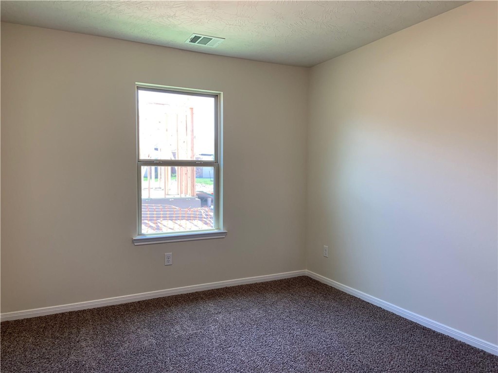 139 Bates Court Huntsville, TX 77320 - Photo 17 of 21 an empty room with a window