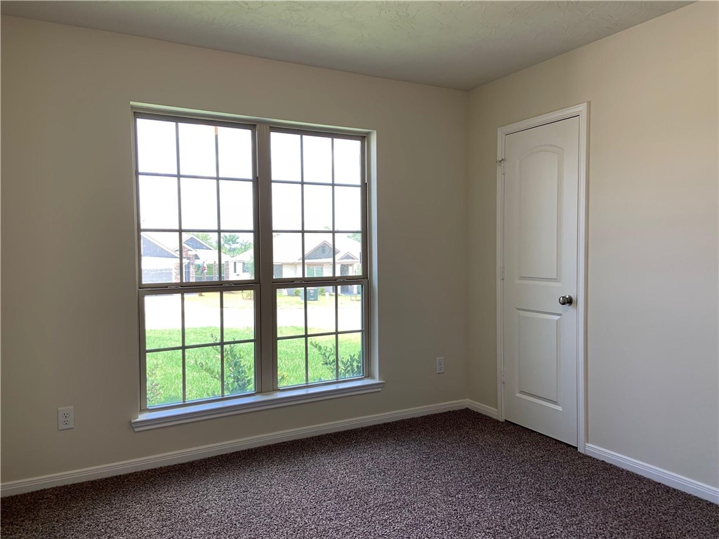 139 Bates Court Huntsville, TX 77320 - Photo 18 of 21 an empty room with a window