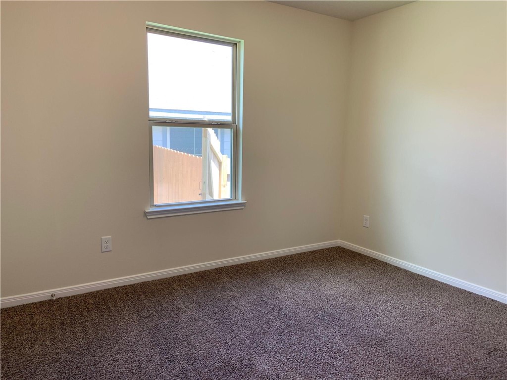 139 Bates Court Huntsville, TX 77320 - Photo 19 of 21 an empty room with a window
