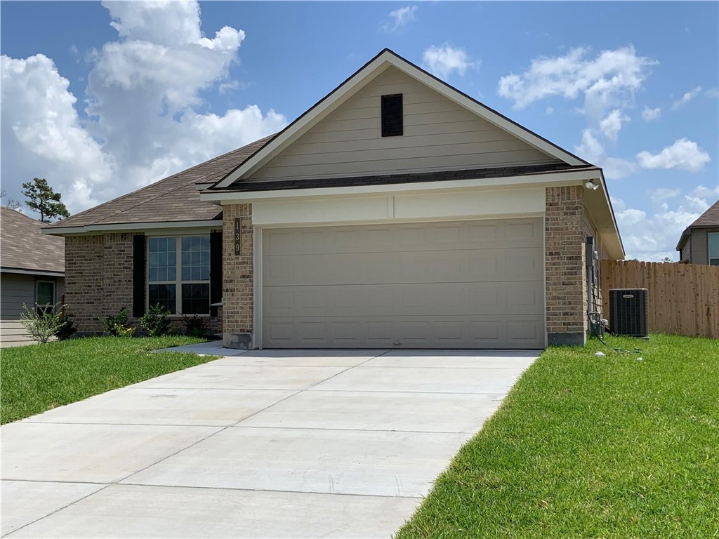 139 Bates Court Huntsville, TX 77320 - Photo 5 of 21 a front view of a house with garden