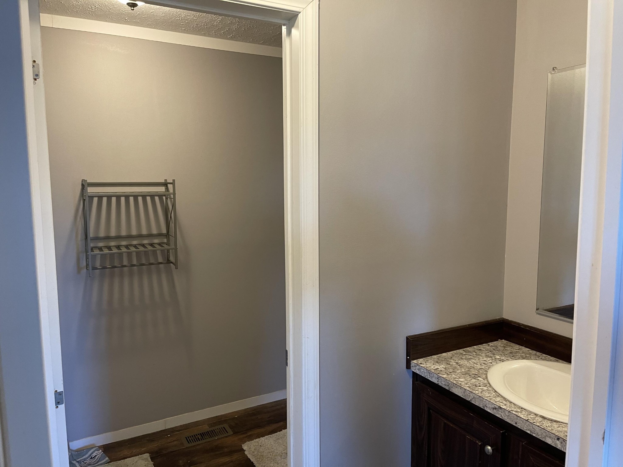 1865 O'Neil Road Newport, TN 37821 - Photo 12 of 19 a bathroom with a granite countertop sink and vanity
