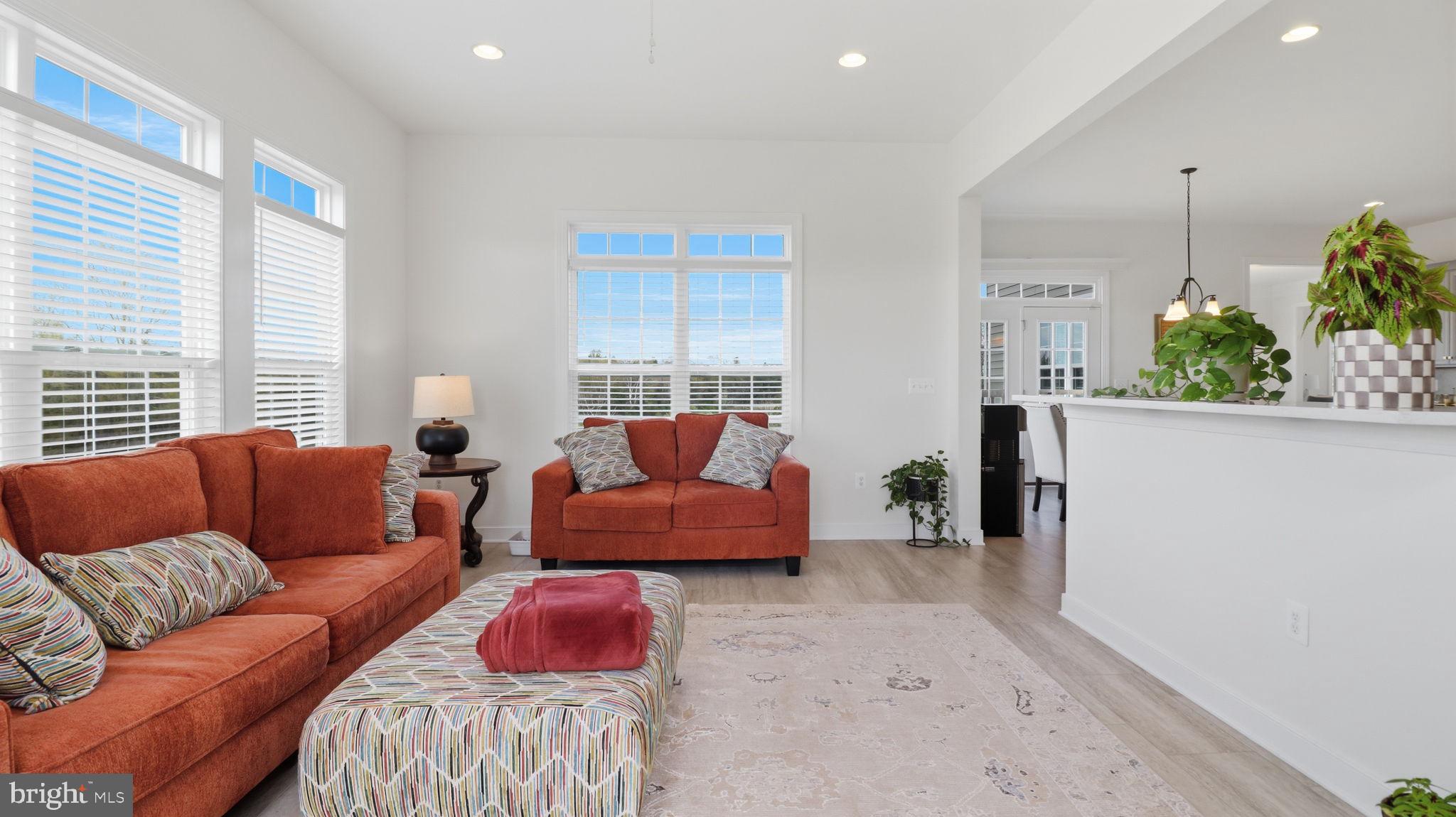 11502 Aden Road Nokesville, VA 20181 - Photo 47 of 106 a living room with furniture and potted plants