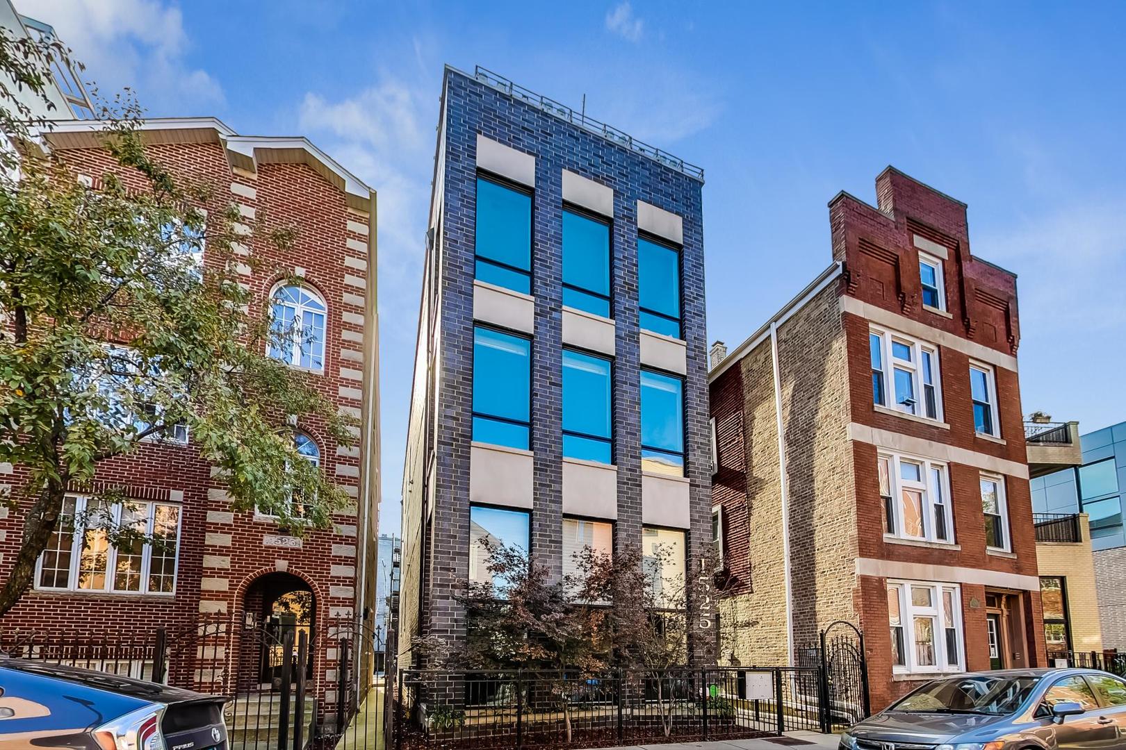 1525 West Fry Street, Unit 2 Chicago, IL 60642 - Photo 1 of 33 a front view of a multi story building
