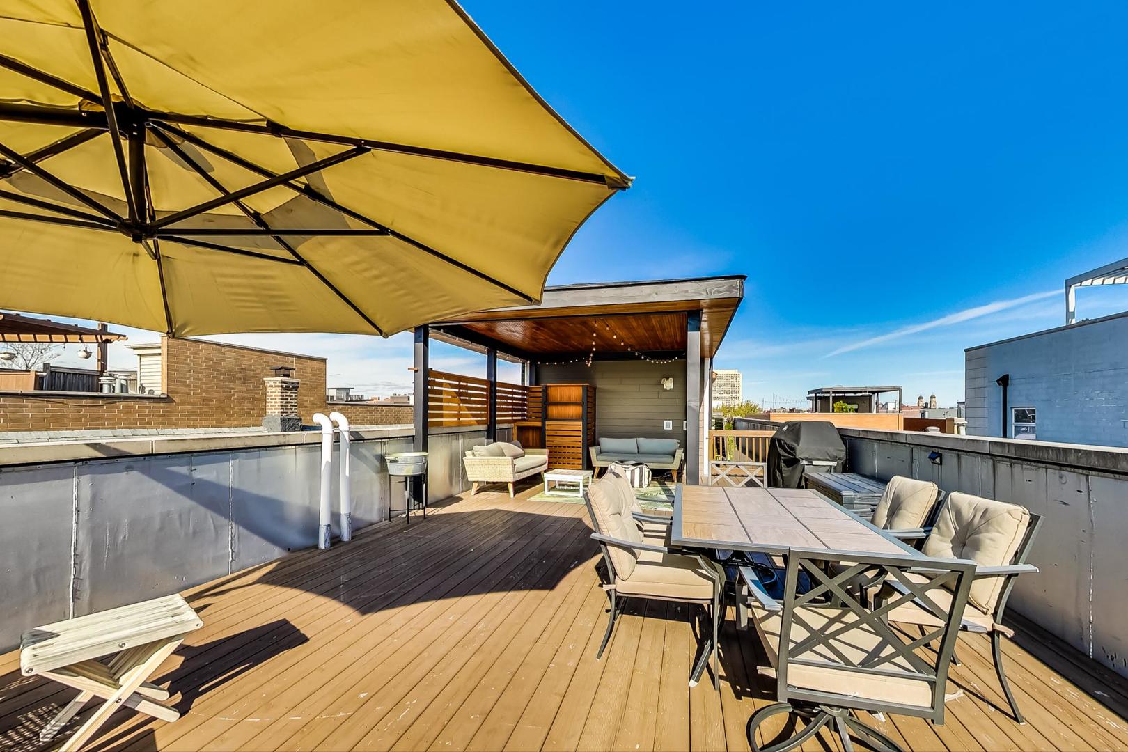 1525 West Fry Street, Unit 2 Chicago, IL 60642 - Photo 27 of 33 a view of a terrace with furniture and stove