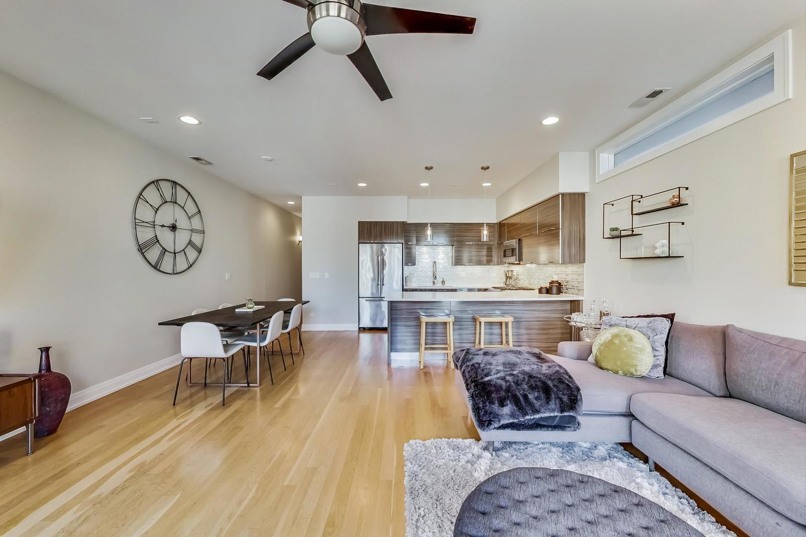 1525 West Fry Street, Unit 2 Chicago, IL 60642 - Photo 5 of 33 a living room with furniture and a wooden floor