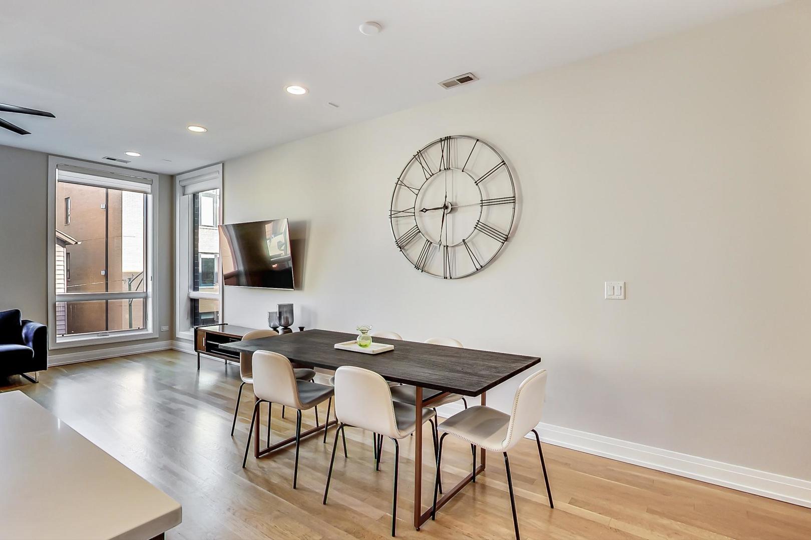 1525 West Fry Street, Unit 2 Chicago, IL 60642 - Photo 8 of 33 a view of a livingroom with furniture window and wooden floor