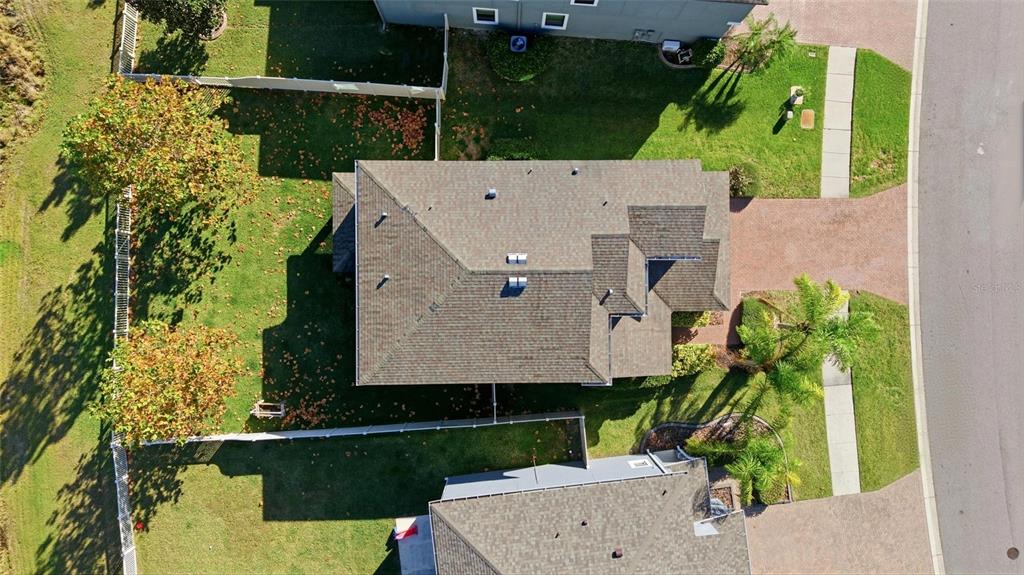 19656 Long Lake Ranch Boulevard Lutz, FL 33558 - Photo 30 of 44 an aerial view of a house with a yard basket ball court and outdoor seating