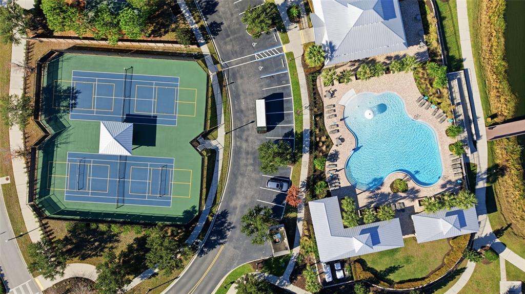 19656 Long Lake Ranch Boulevard Lutz, FL 33558 - Photo 41 of 44 an aerial view of a house with garden space and outdoor seating