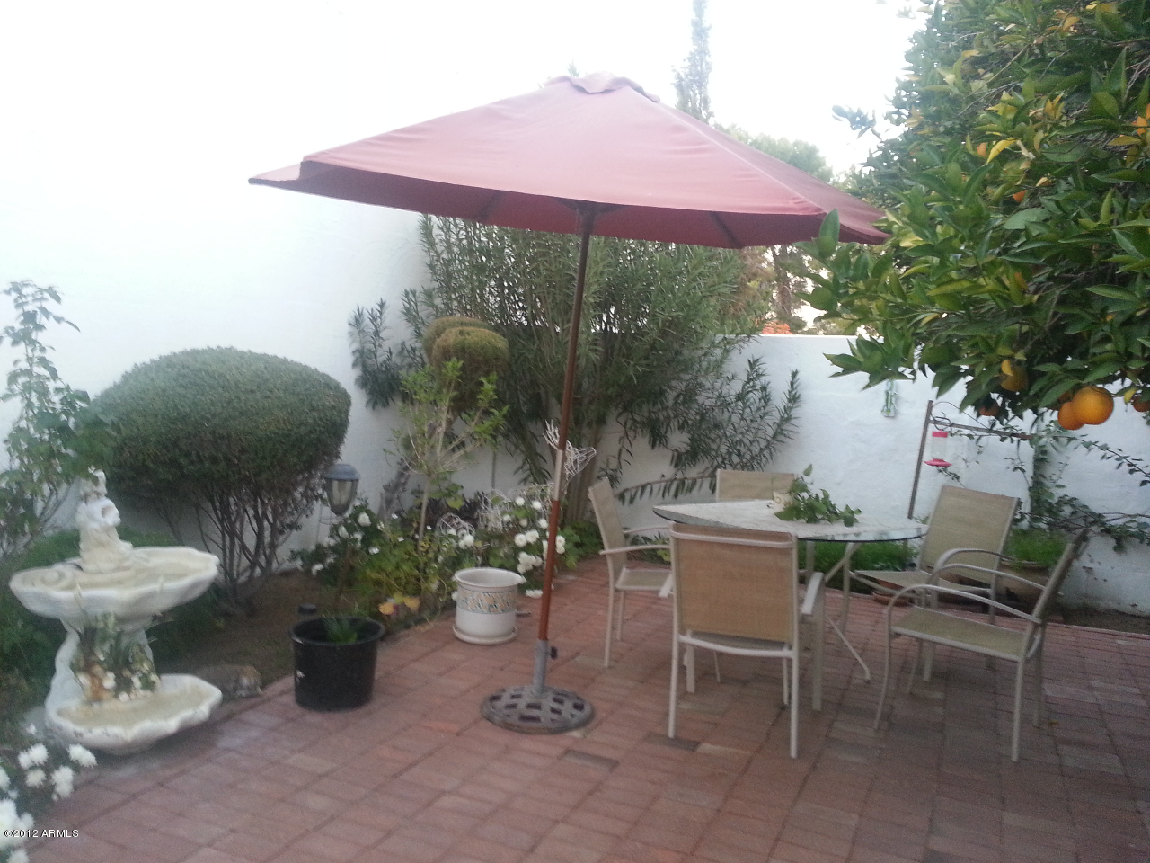 531 East Boca Raton Road Phoenix, AZ 85022 - Photo 9 of 26 Brick Patio Off Kitch 20121212_172024