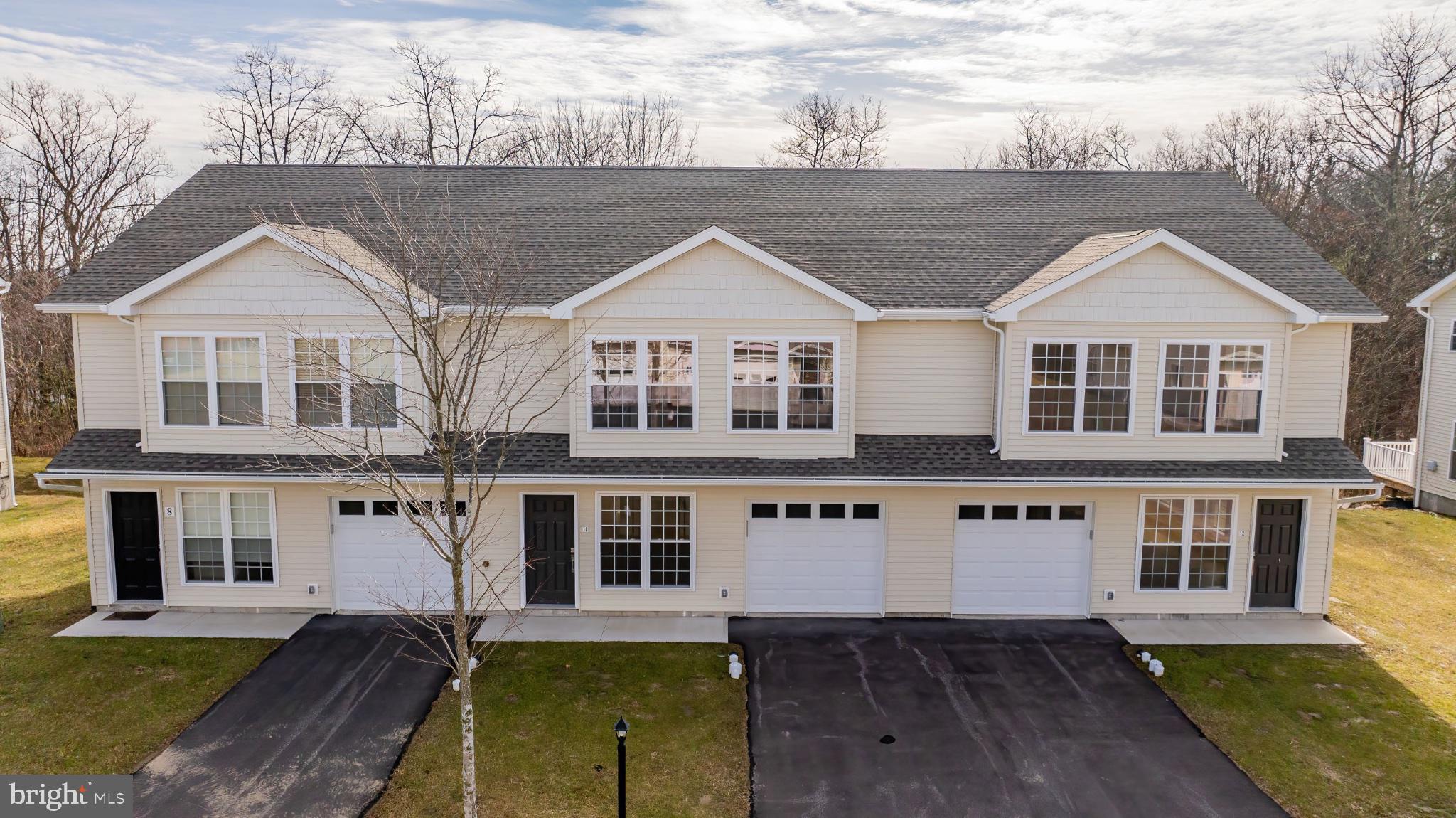13 Nicole Lane Hazleton, PA 18202 - Photo 1 of 23 front view of a house with a yard