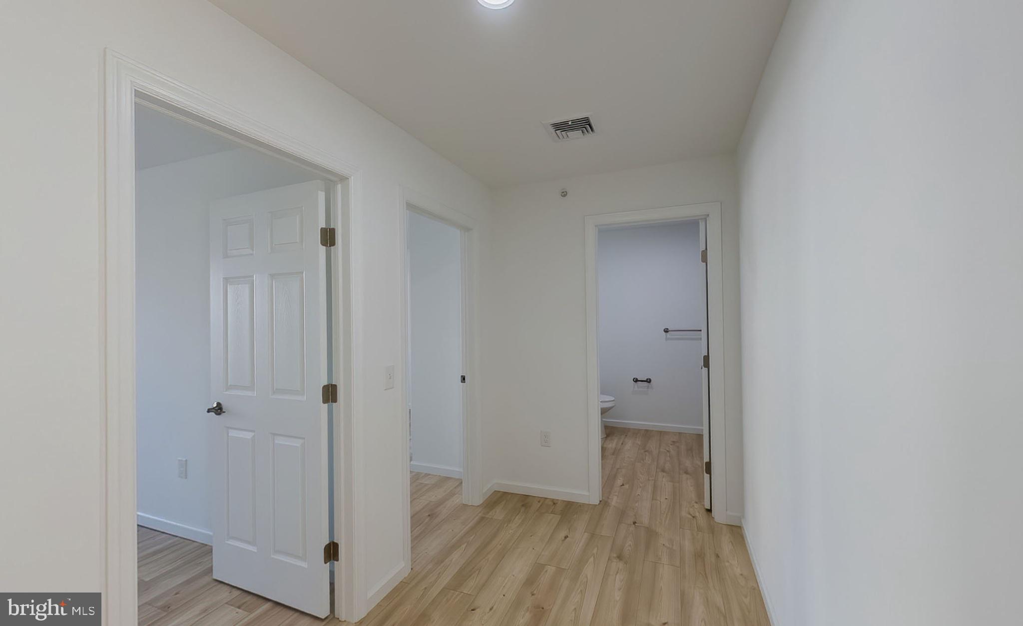 13 Nicole Lane Hazleton, PA 18202 - Photo 12 of 23 a view of a hallway with wooden floor