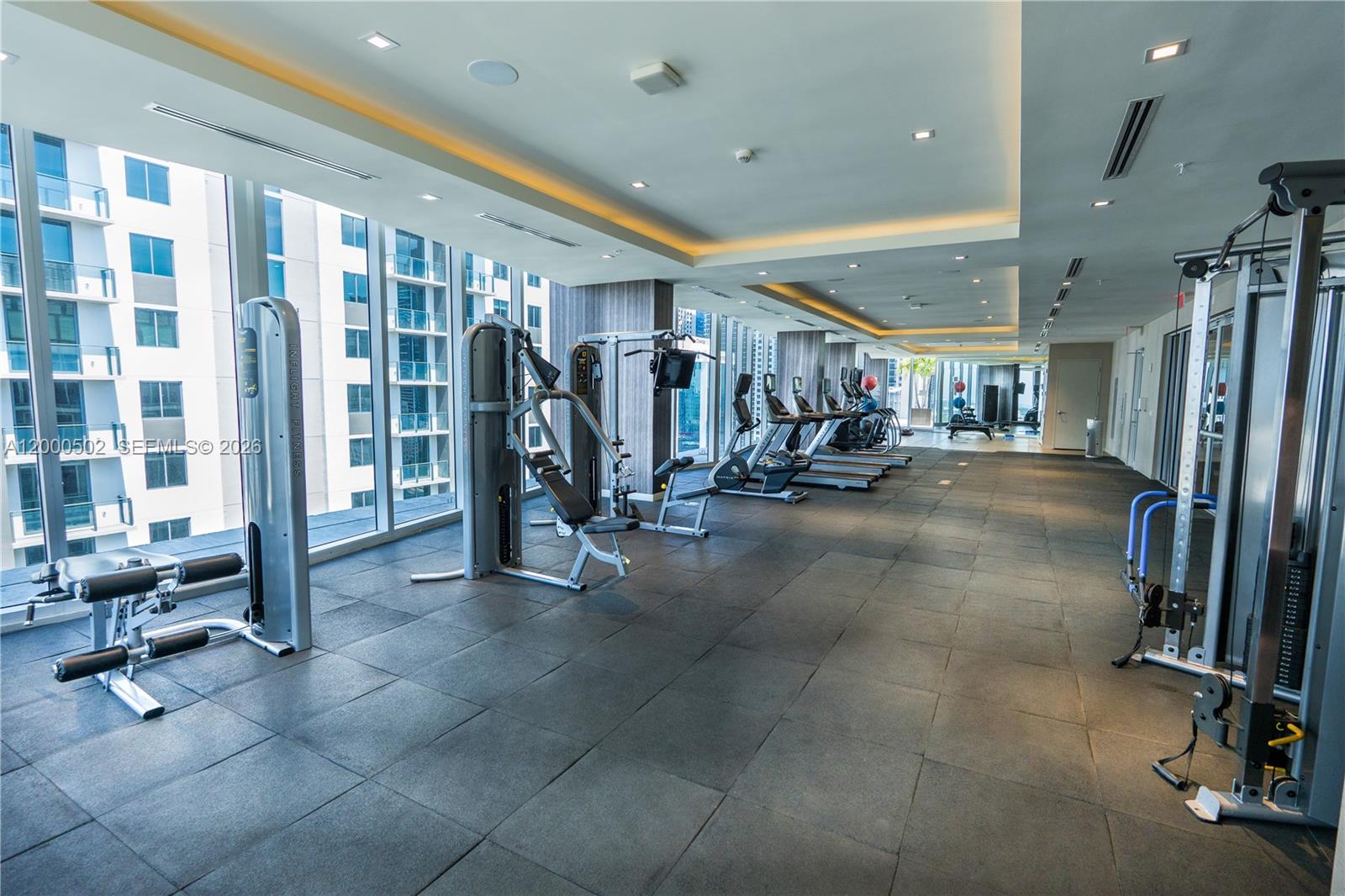 1010 Southwest 2nd Avenue, Unit 606 Miami, FL 33130 - Photo 26 of 46 a view of a room with gym equipment