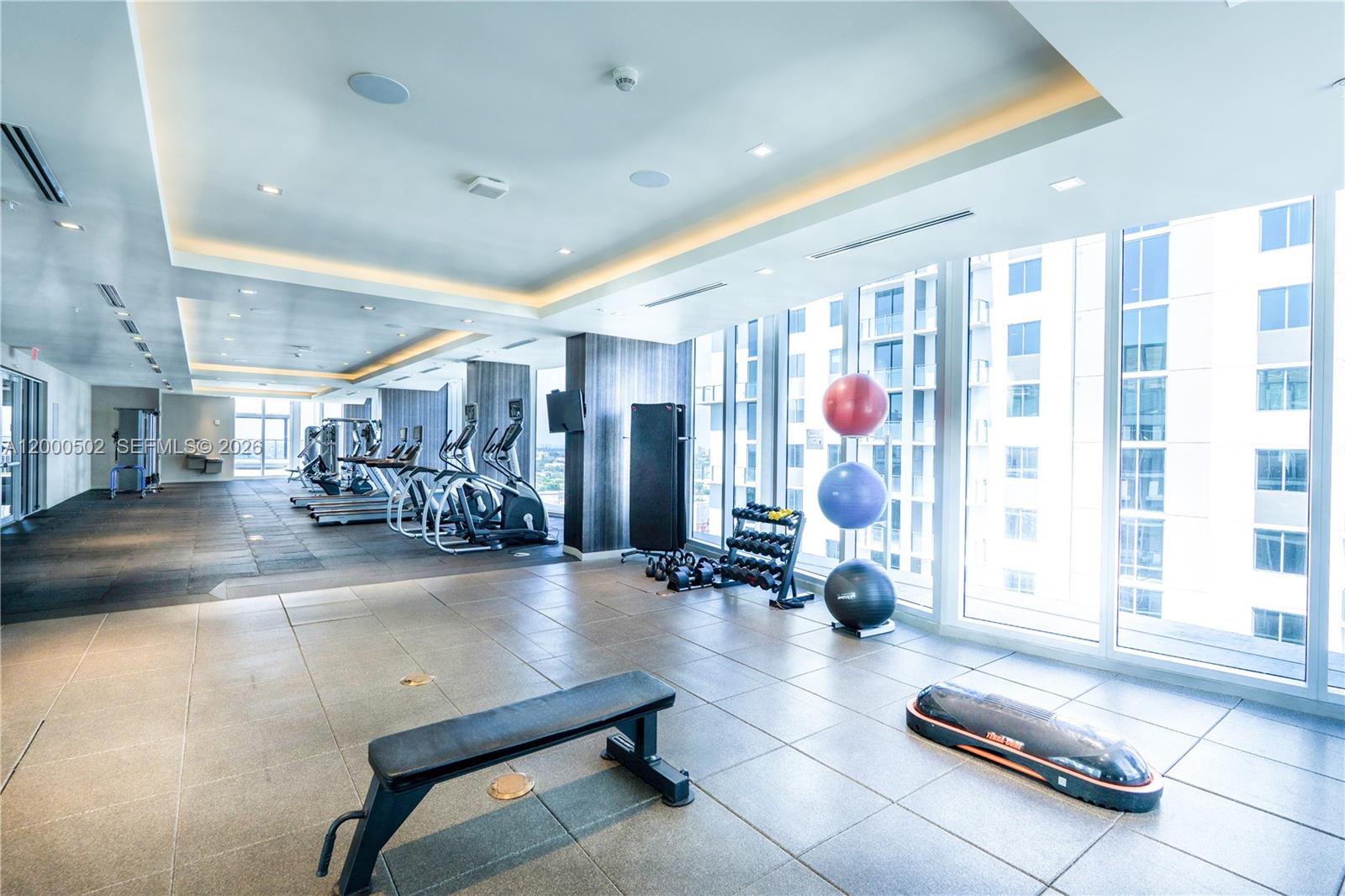 1010 Southwest 2nd Avenue, Unit 606 Miami, FL 33130 - Photo 27 of 46 a room with lots of gym equipment