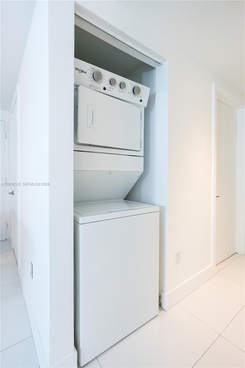 1010 Southwest 2nd Avenue, Unit 606 Miami, FL 33130 - Photo 5 of 46 a utility room with dryer and washer