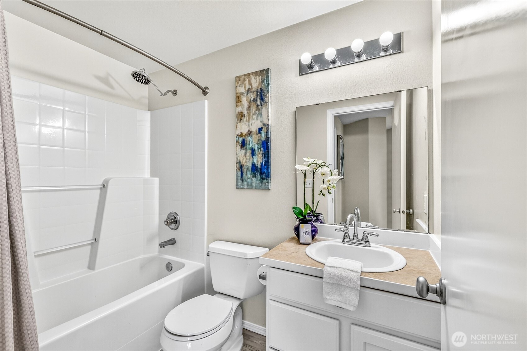 3918 152nd Place Southeast Bothell, WA 98012 - Photo 12 of 31 a bathroom with a sink toilet tub and shower