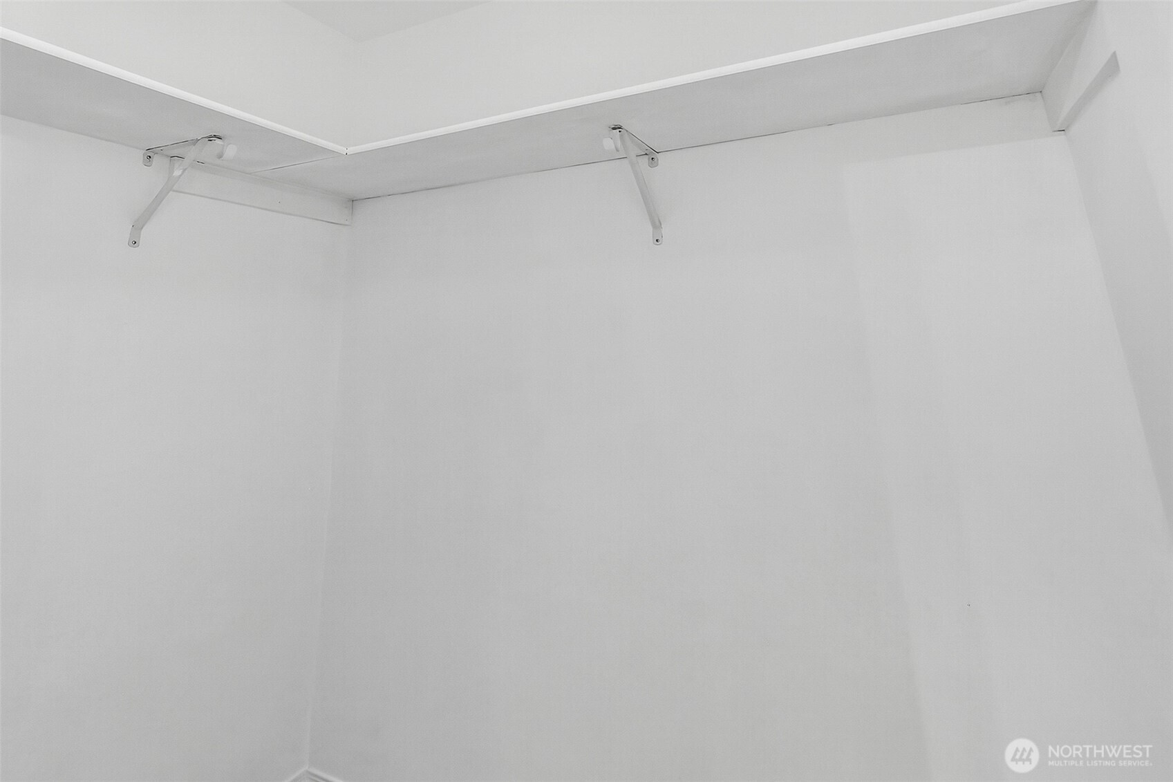 3918 152nd Place Southeast Bothell, WA 98012 - Photo 13 of 31 a view of a room with racks on the wall