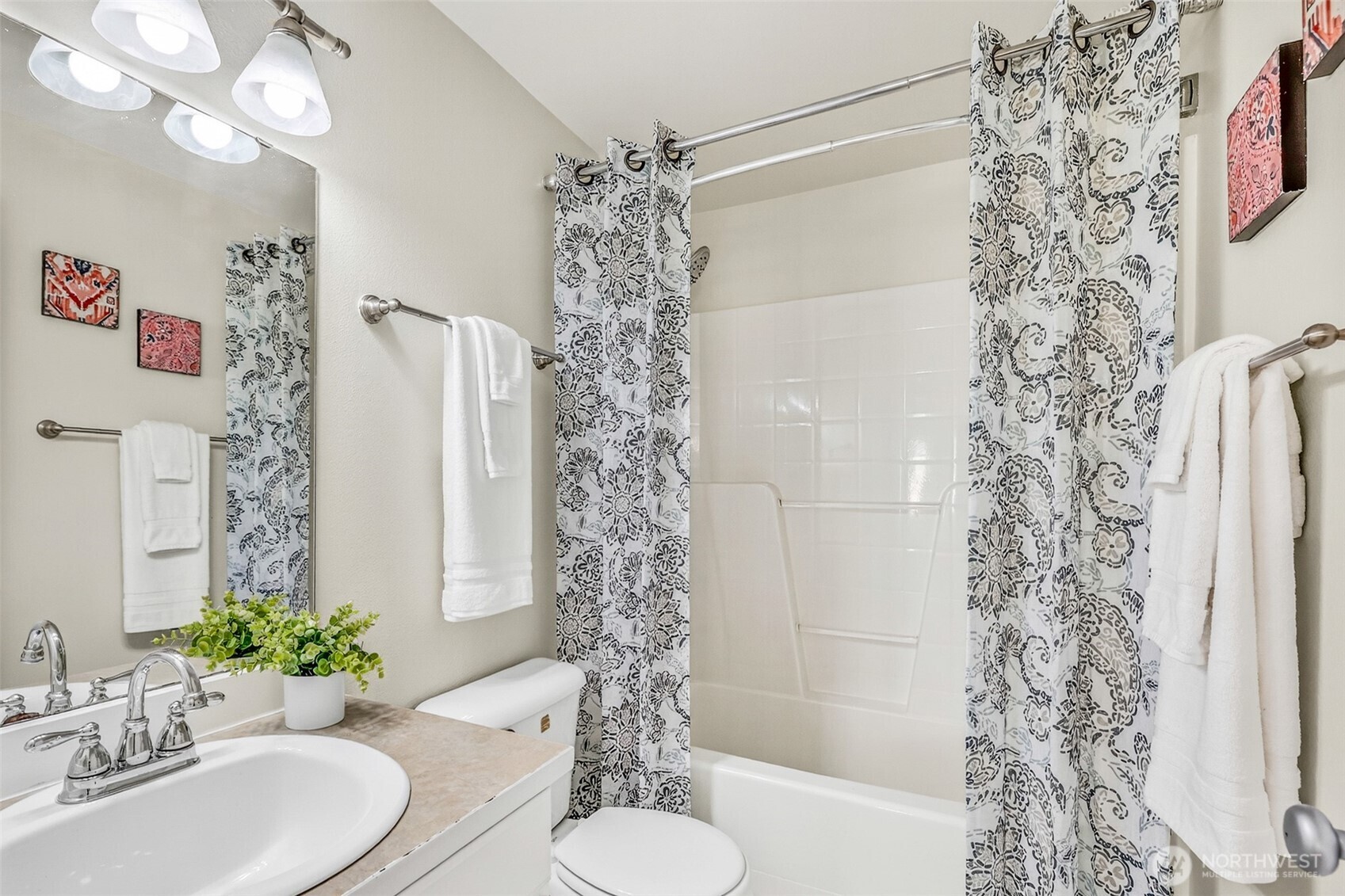 3918 152nd Place Southeast Bothell, WA 98012 - Photo 16 of 31 a bathroom with a sink toilet and shower