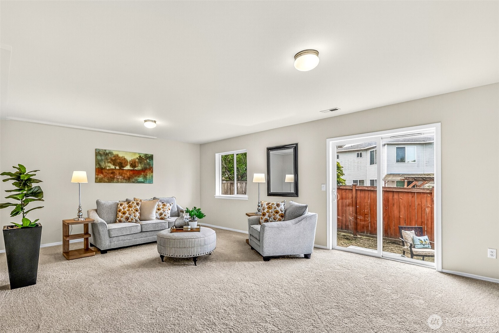 3918 152nd Place Southeast Bothell, WA 98012 - Photo 17 of 31 a living room with furniture and a potted plant